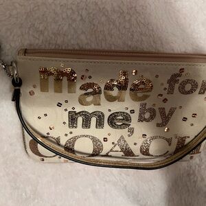 Coach Cream and Gold Wristlet with Glitter Accents